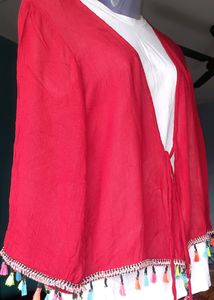 IT IS A SHRUG With Tassel