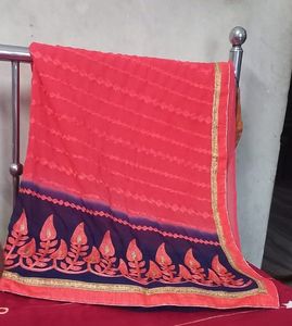 Elegant Red Saree with Embroidered Border