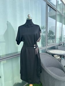 Elegant Black Dress with Fringe Detail