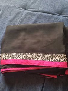 Black Plain Saree With Pink Border