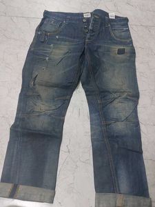 Distressed Blue Denim Jeans