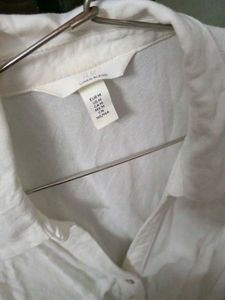 Chic Sleeveless White Button-Up Top