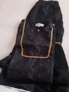like New  Elegant Black Kurta Set with Gold Trim