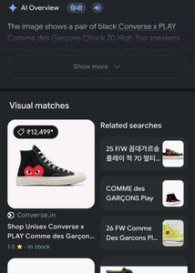 Comme des Garcons Play Chuck Taylors