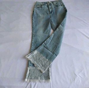 Light Wash Flare Jeans with Lace Trim