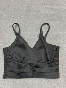 black ruched off-shoulder top or bandeau-style cro