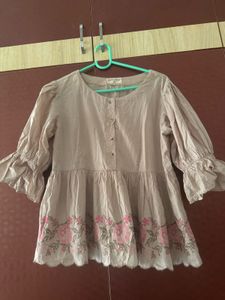 Embroidered Peplum Blouse