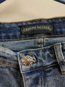 Chrome Hearts cross patch graphic blue jeans