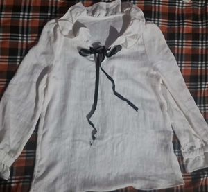 Chic White Ruffled Blouse with Black Bow