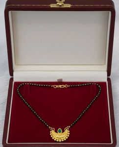 Elegant Gold Mangalsutra with Emerald