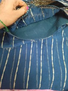 Elegant Teal Saree with Golden Stripes