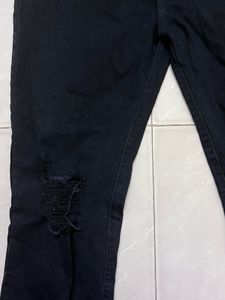 Ripped Hem Black Jeans