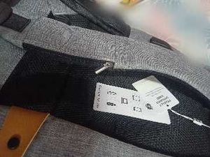 Stylish Grey Backpack with Tags