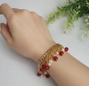 Gold Chain Bracelet with Red and Pearl Charms