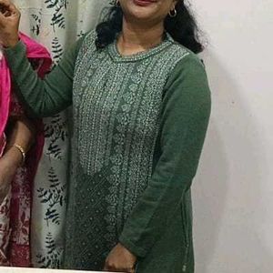 Women's Green Kurta with Intricate Print