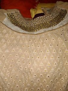 Elegant Beige Kurta with Embellished Neckline