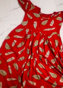 girls red frock + gift