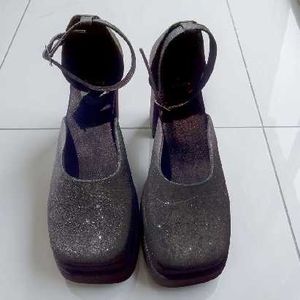 Black shimmer double platform heels