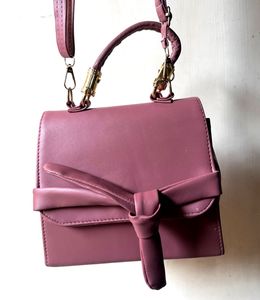 Chic Pink Handbag with Bow Detail