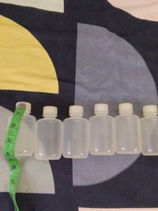 Set of 6 Small Plastic Bottles