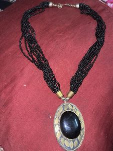 Elegant Beaded Necklace with Black Stone Pendant