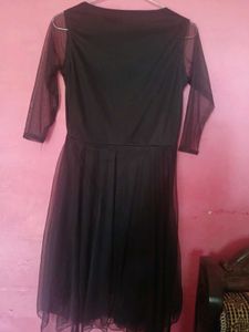 Elegant Black Dress with Sheer Sleeves