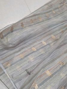 Elegant Striped Saree with Gold Accents