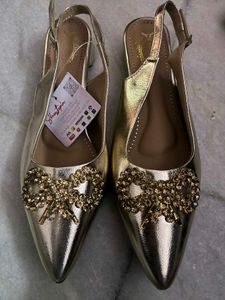 Sparkling Gold Slingback Heels with Bow Accent
