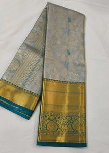 Exquisite Grey Silk Saree with Gold Border