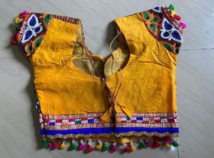 Vibrant orange &amp; Blue Embroidered Lehenga Choli