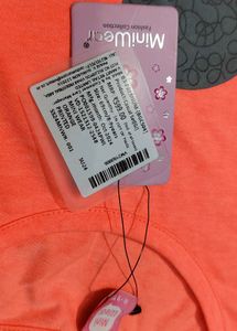 Cute Girls Orange T-Shirt and Polka Dot Skirt Set