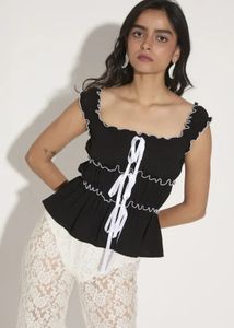 Chic Black Peplum Top with Ribbon