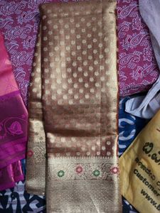 Beautiful Golden tissue saree with blouse piece