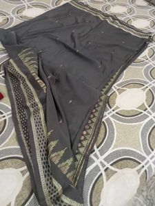 Elegant Grey Saree with Intricate Border