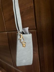 Grey half moon sling bag