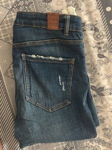Blue Distressed Denim Jeans