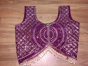 Stunning Purple Embroidered Lehenga Choli