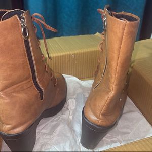 Stylish Brown Lace-Up Boots with Embellishments