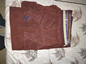Elegant Brown Saree with Intricate Border