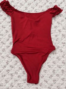 Chic Red Ruffled Bodysuit with Bow Detail