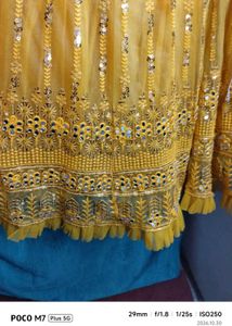 Stunning Yellow Sequined Lehenga Choli