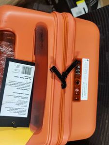 Mokobara Orange Hardshell aisle trunk Suitcase