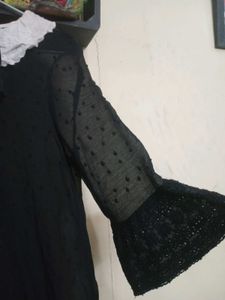 Sheer Black Dress with White Collar