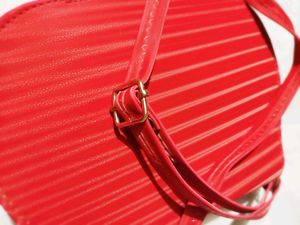 Red Stylish Striped Sling Bag....👛