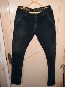 2 numbers of Distressed Blue Jeans
