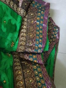 Vibrant Green Saree with Embellished Border