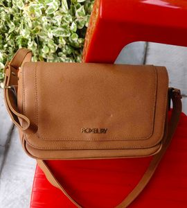 Roxbury brown sling bag