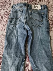 Light Wash Distressed Denim Jeans