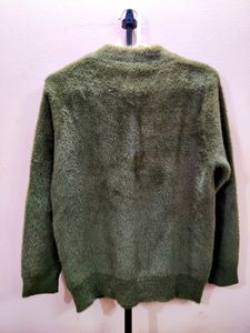 Imported women's fuzzy knit sweater with a high ne