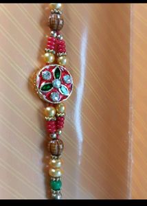 Stone Petaled Rakhi For Raksha Bandhan